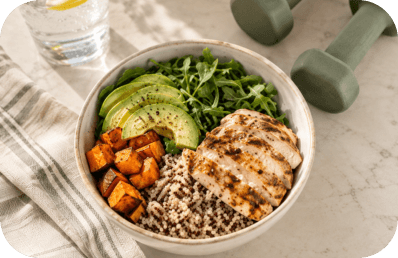 A protein bowl with chicken, quinoa, sweet potato and avocado
